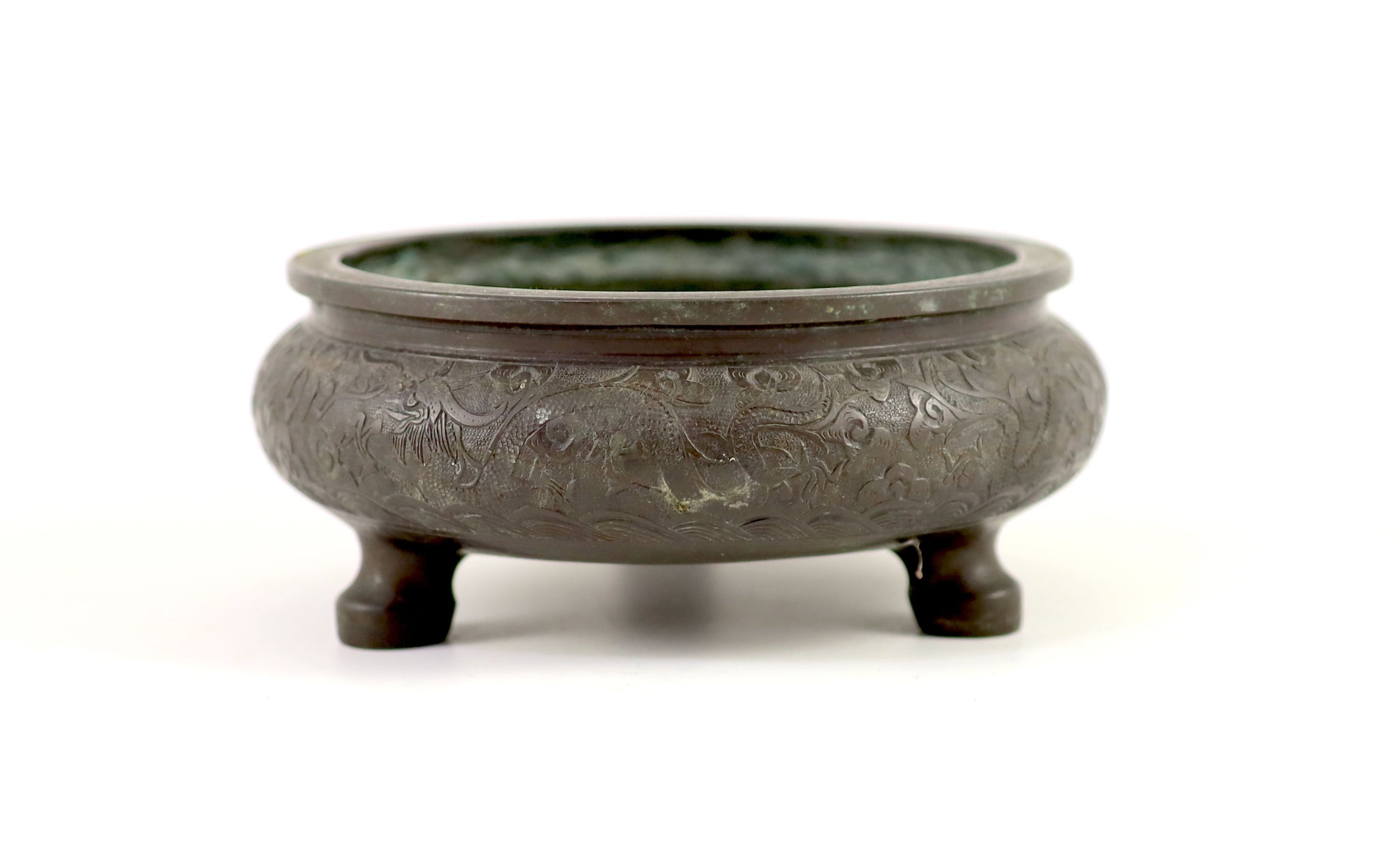 A Chinese bronze tripod censer, ding, 19th century, 20 cm diameter